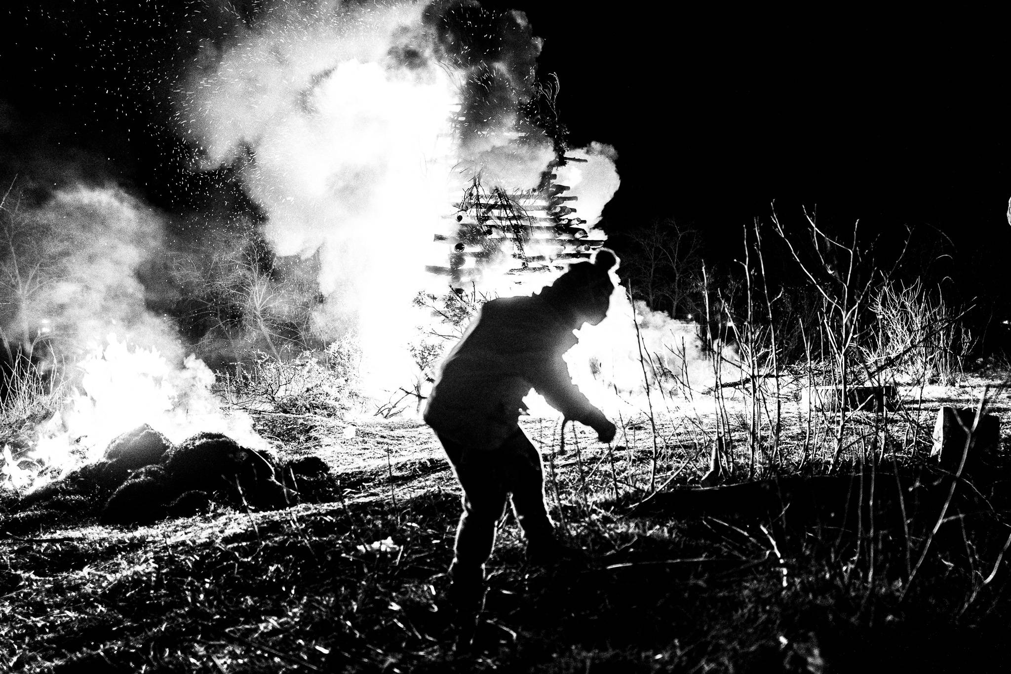 The bonfire at Achlada is lit, Pagan Christmas customs of Northern Greece, by photographer George Tatakis