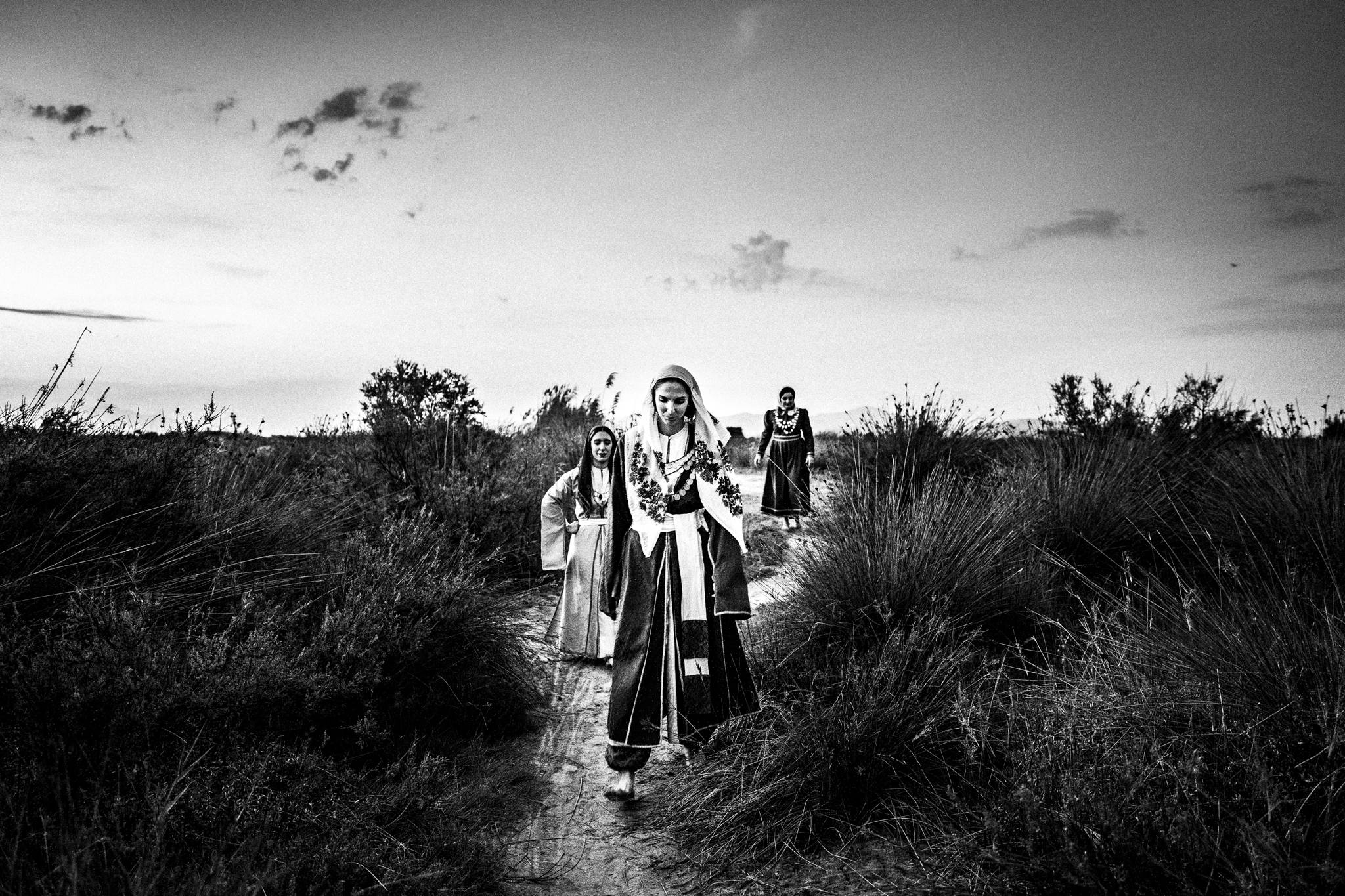 Traditional costumes of Kos in the salt lake of Tigkaki, Kos, by photographer George Tatakis