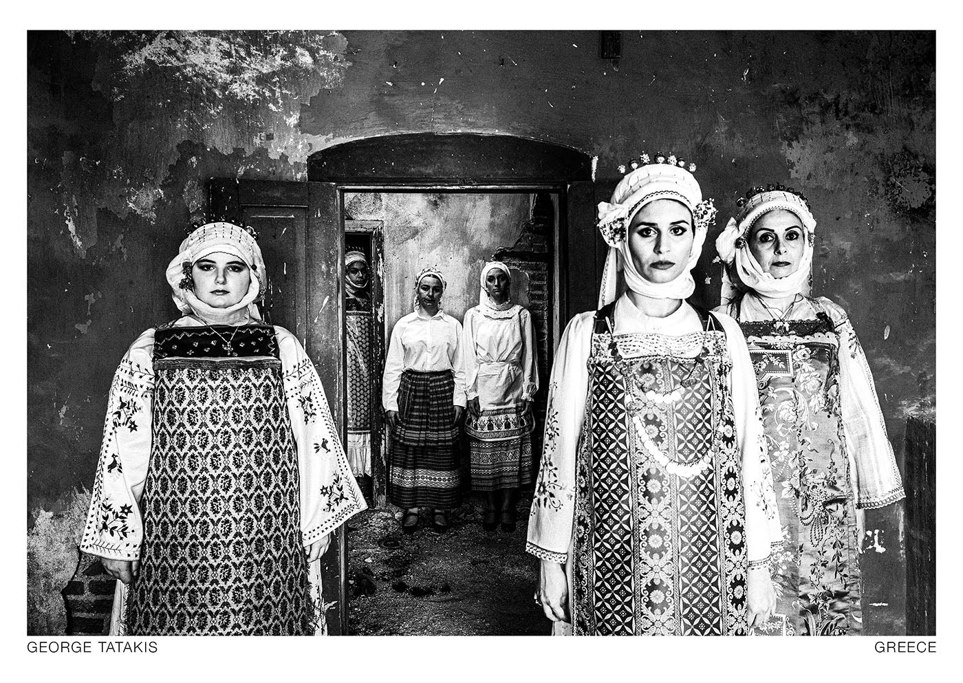 A group of women at the mastic-producing village of Olympoi on the island of Chios, posing in the local attires. Black and white photography postcard by George Tatakis, project Caryatis.